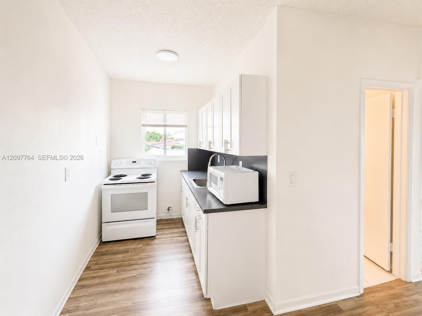 384 Tamiami Canal Rd # 2, Miami FL 33144 photo 2