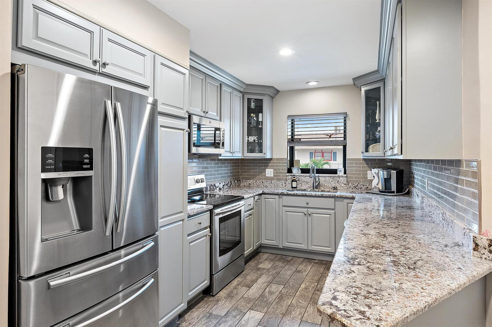 755 Saturn Street # E203, Jupiter FL 33477 photo 2