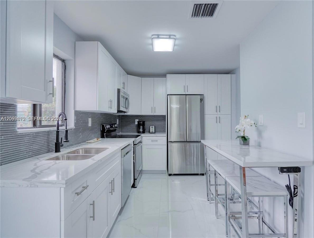 173 NW 47th St # 0, Miami FL 33127 photo 2