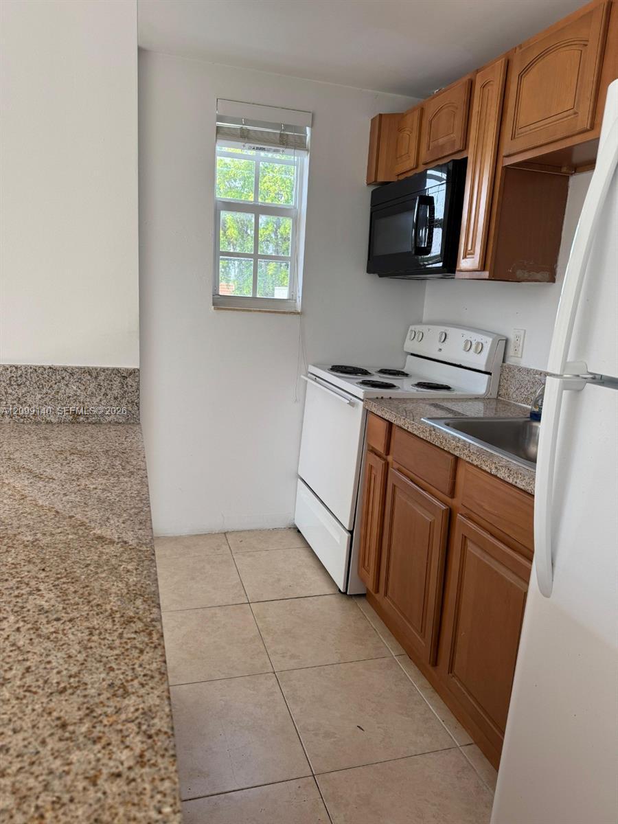 7130 Rue Versailles # 11, Miami Beach FL 33141 photo 3