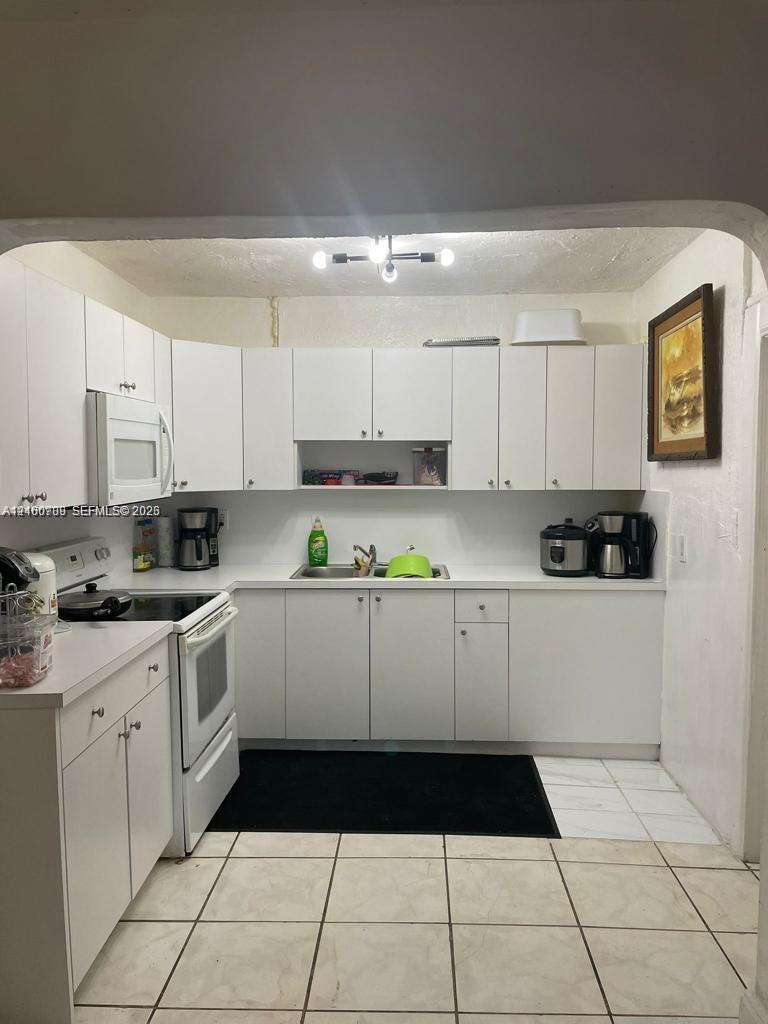 1137 NW 58th Ter, Miami FL 33127 photo 2
