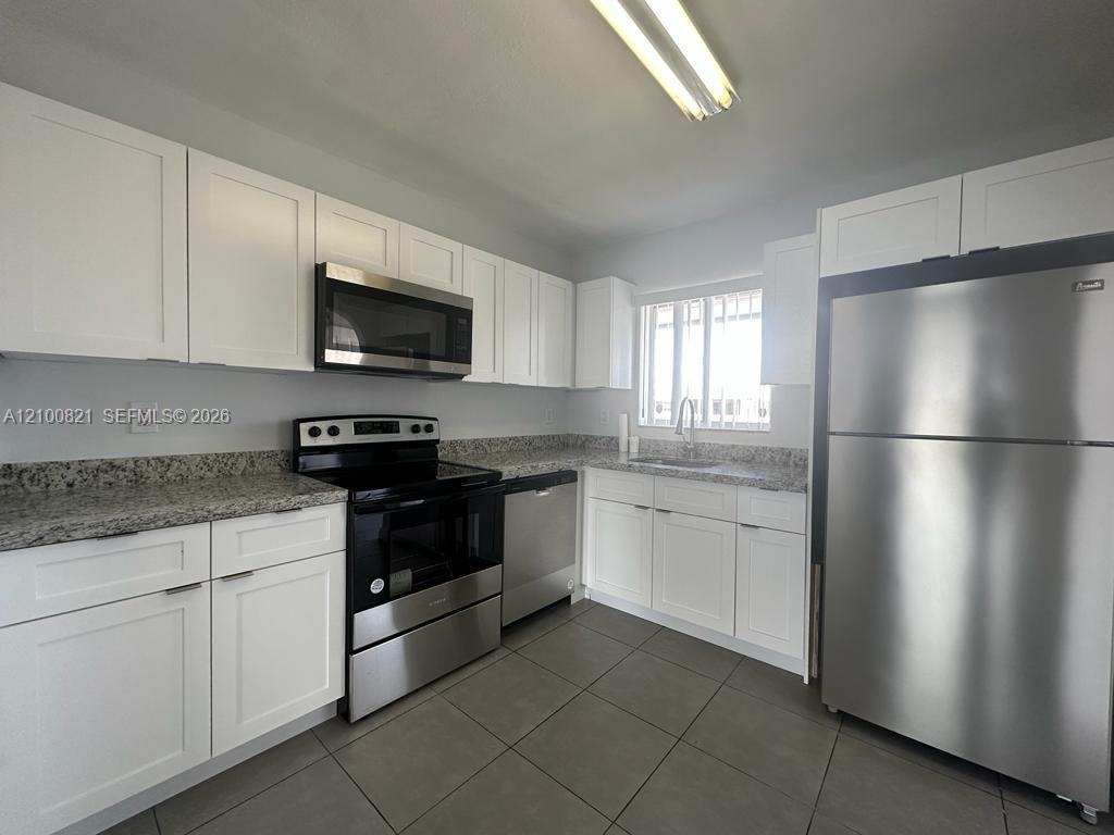 980 NE 170th St # 212, North Miami Beach FL 33162