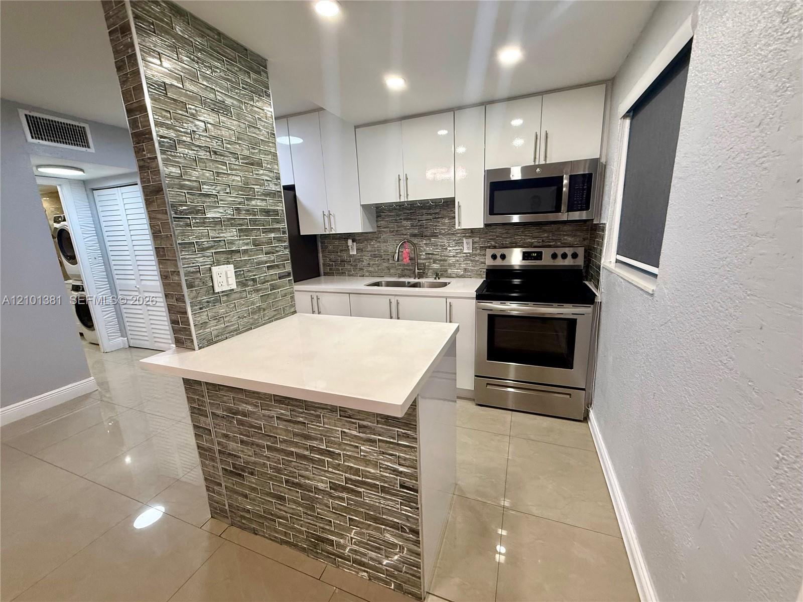 1629 NW N River Dr # 303, Miami FL 33125 photo 2