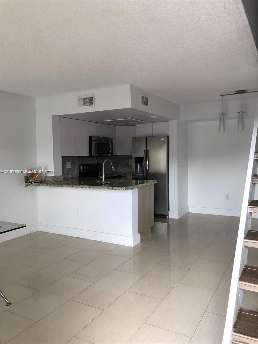 8670 NW 6th Ln # 208, Miami FL 33126 photo 3
