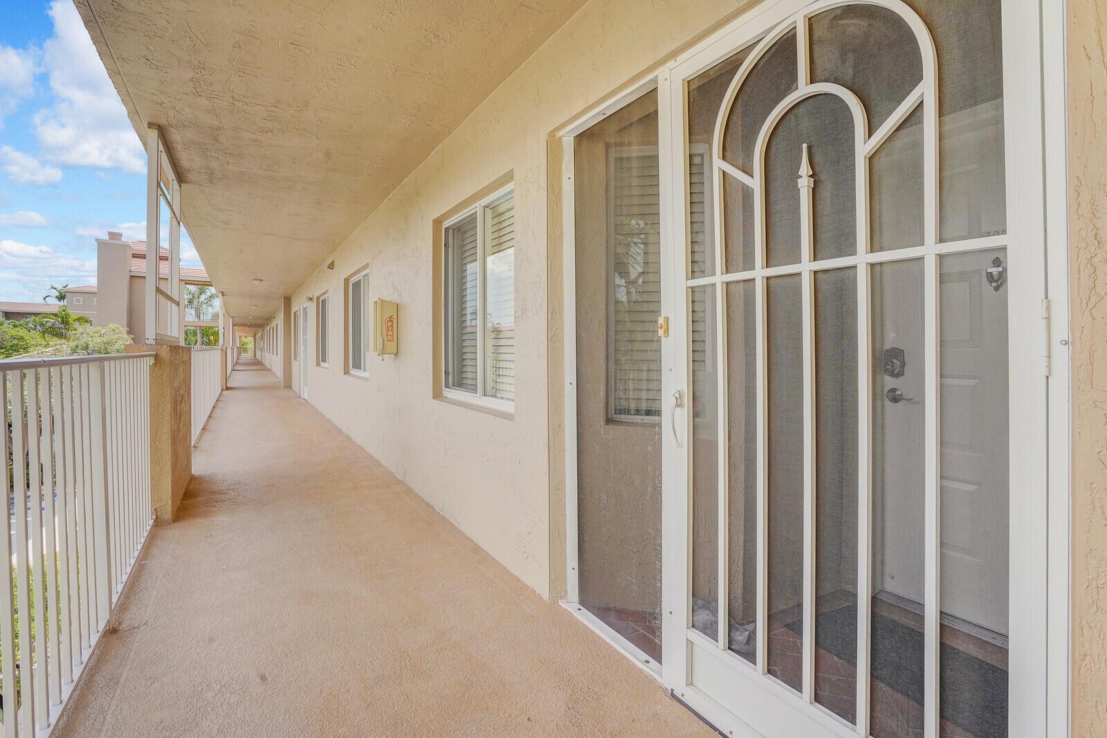 5874 CRYSTAL SHORES Drive # 308, Boynton Beach FL 33437 photo 2