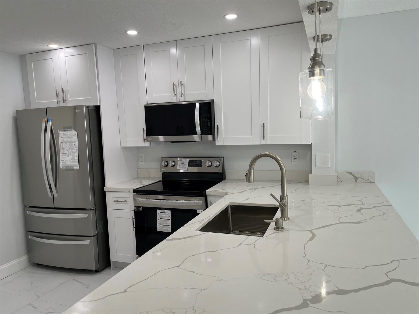 2830 SOMERSET Drive # 211N, Lauderdale Lakes FL 33311 photo 2