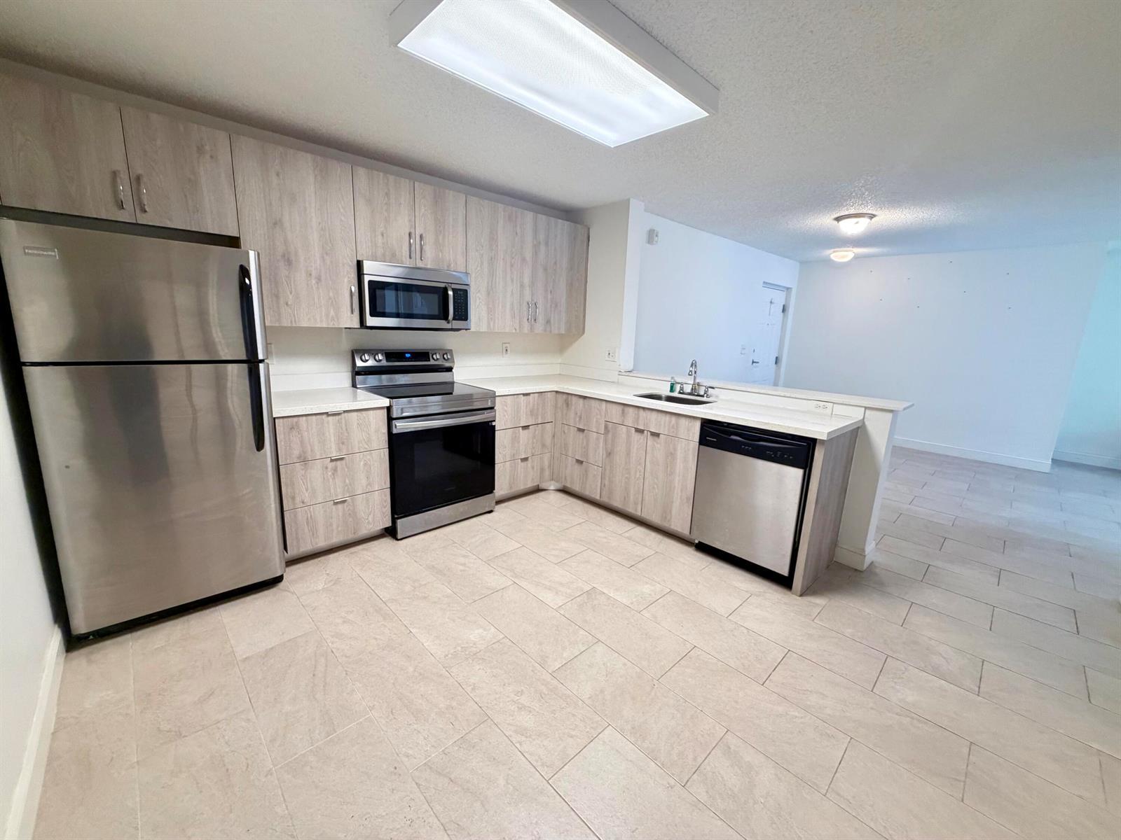 10111 W SUNRISE Boulevard # 104, Plantation FL 33322 photo 2