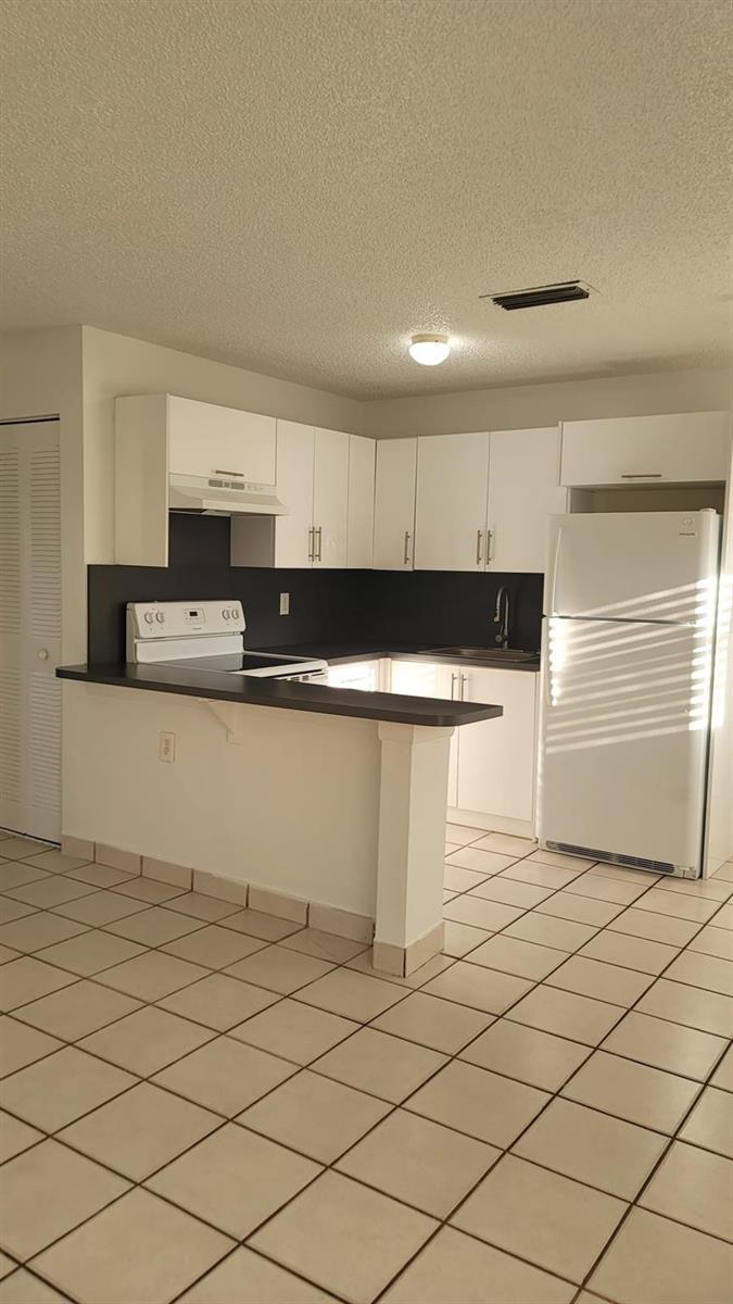 416 LAKESIDE Drive # 128, Margate FL 33063 photo 2