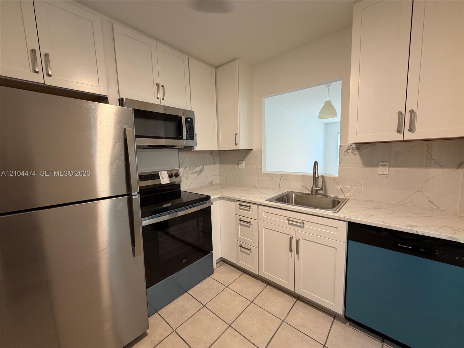 5001 W Oakland Park Blvd # 305, Lauderdale Lakes FL 33313 photo 2