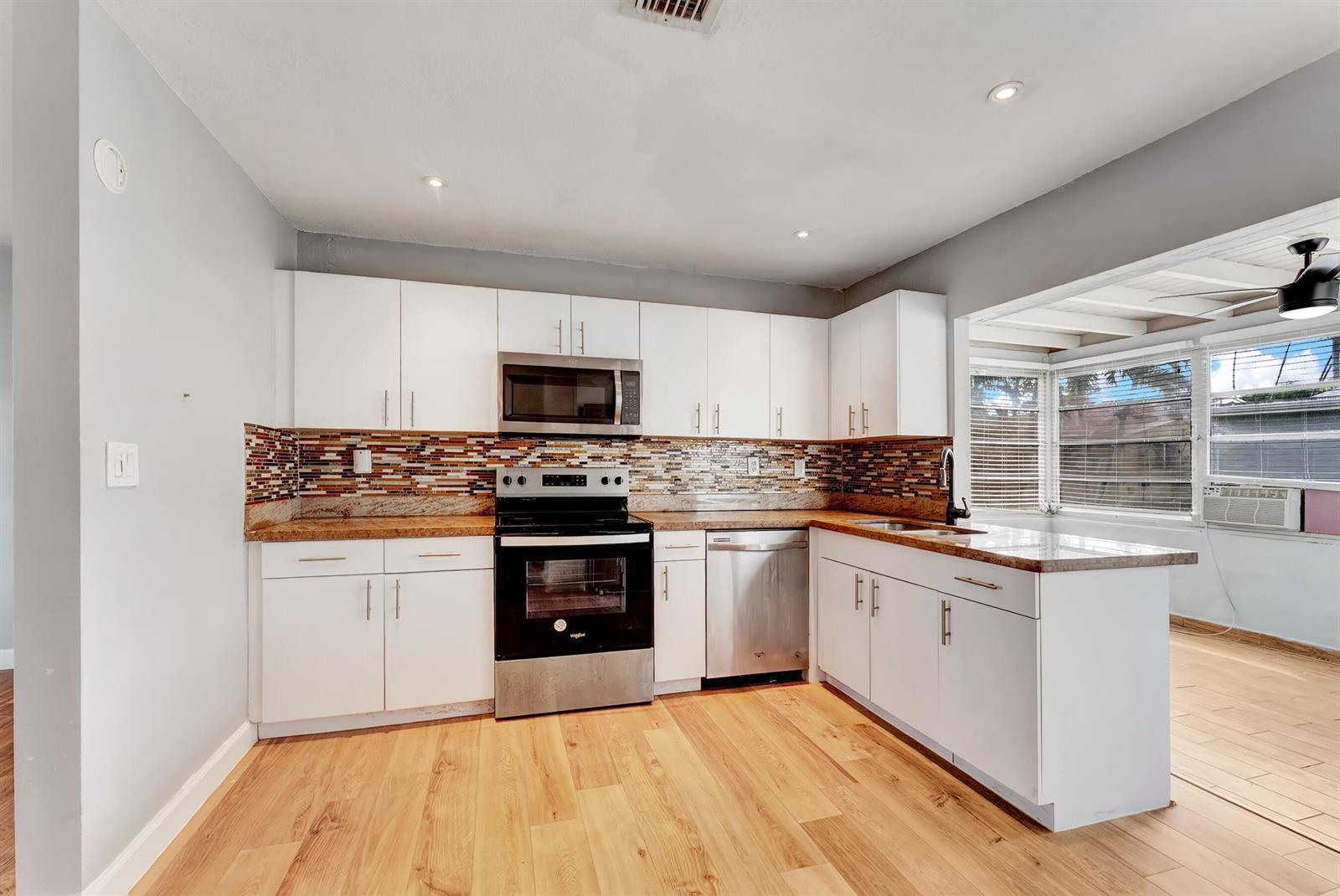 4938 NW 54th Court, Tamarac FL 33319 photo 4