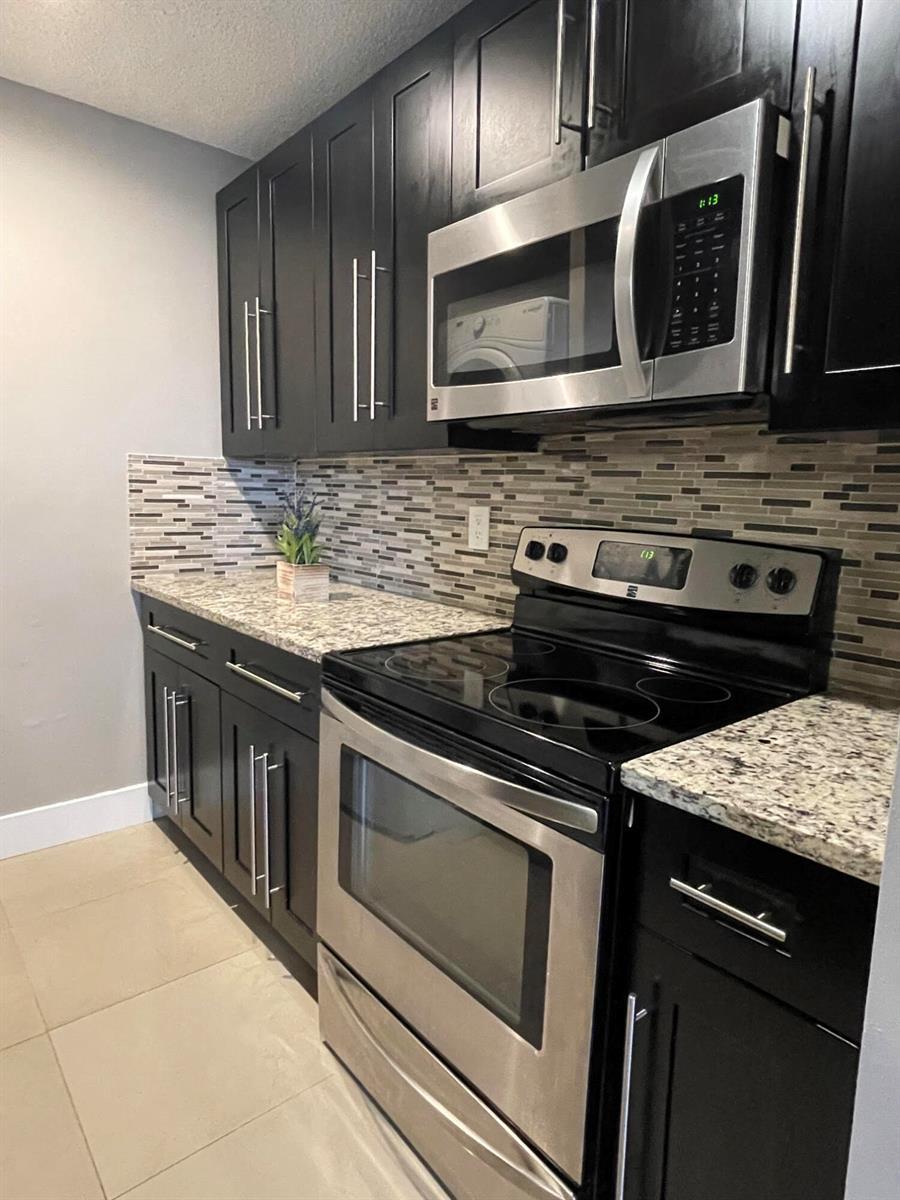 10092 TWIN LAKES Drive # H, Coral Springs FL 33071