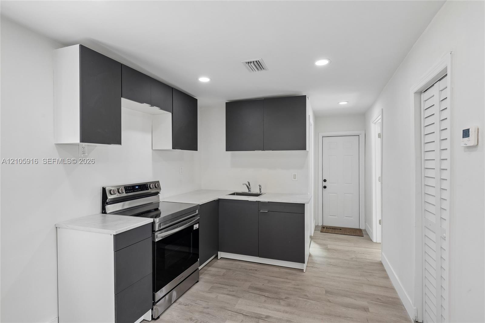 1063 NW 55th Ter, Miami FL 33127 photo 4