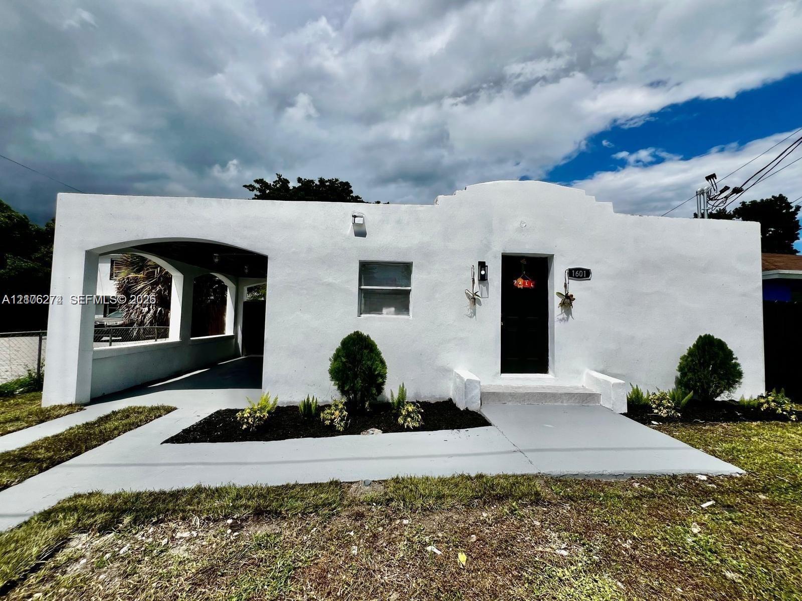 1601 NW 50th St, Miami FL 33142 photo 2