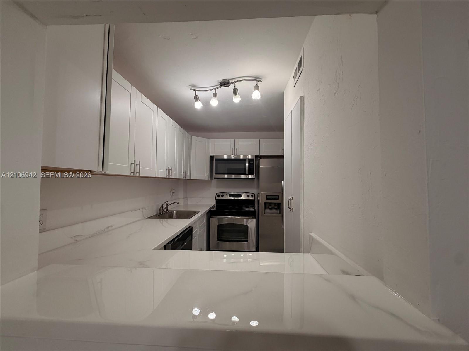 5050 NW 7th St # 103, Miami FL 33126 photo 2