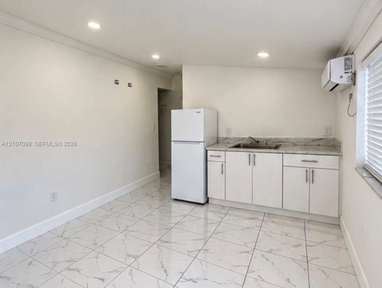 6497 W 8th Ln # A, Hialeah FL 33012 photo 2