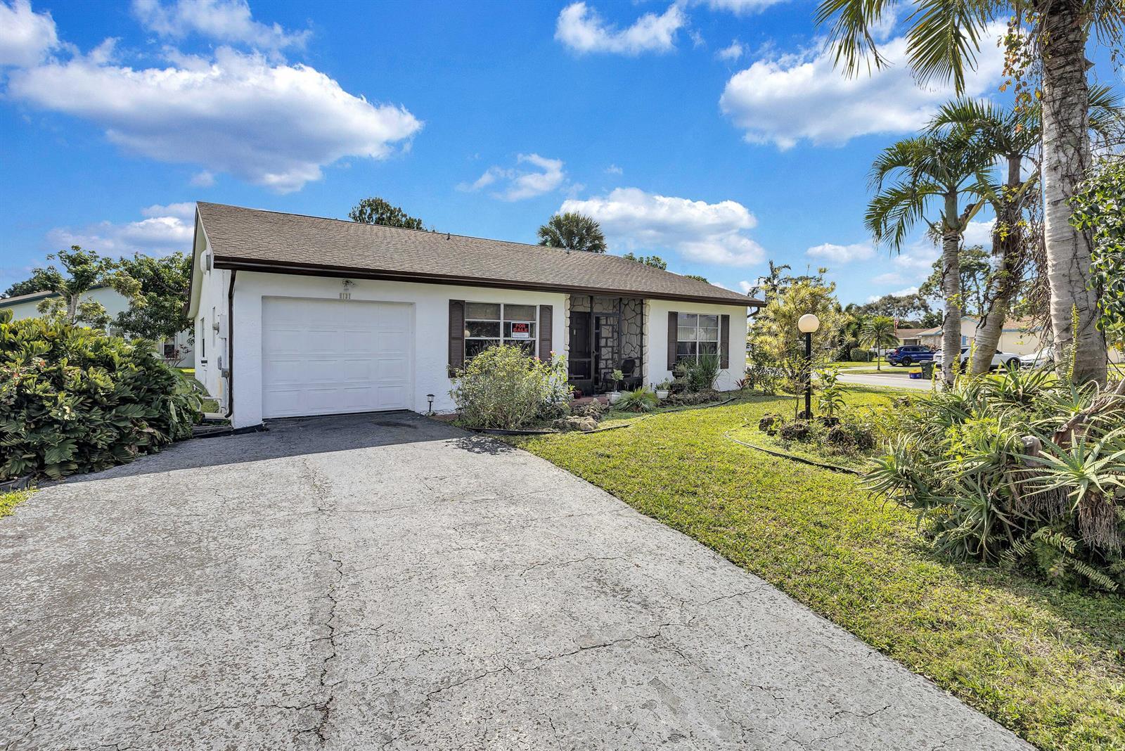 6137 Rainbow Circle, FL 33463