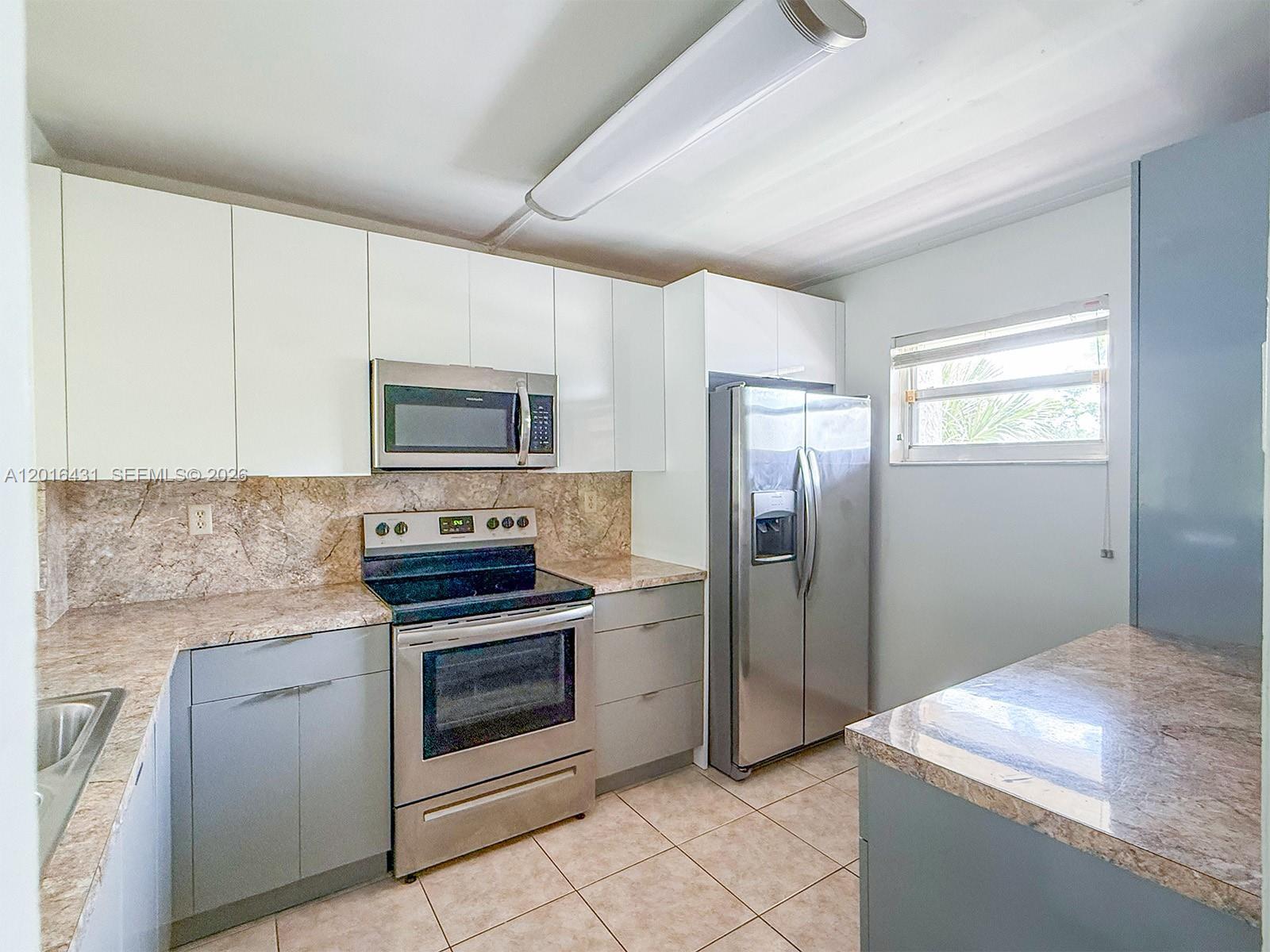 1100 NW 87th Ave # 308, Coral Springs FL 33071