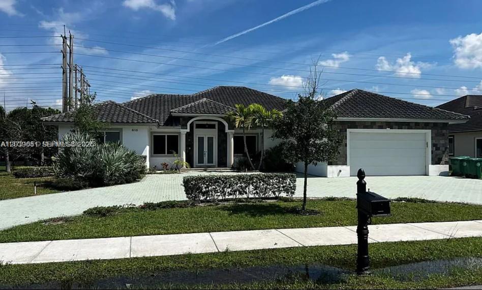 6115 Marinel Say Dr, Davie FL 33314