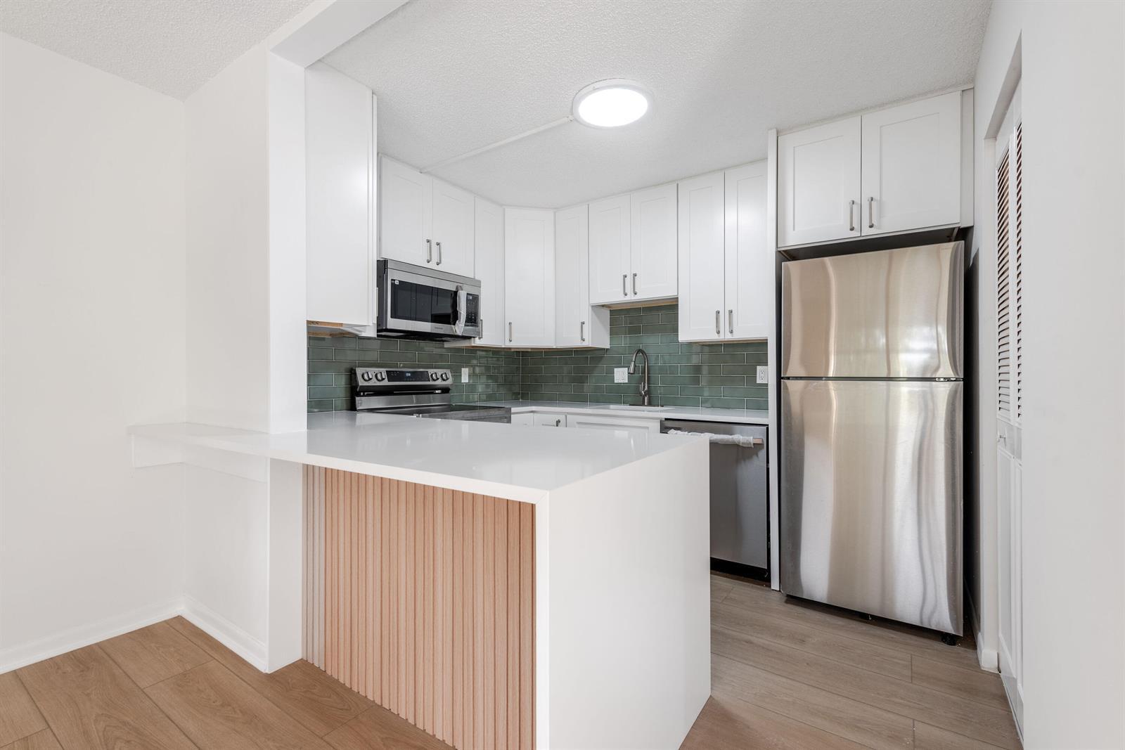 3561 Tall Pine Way # 2, FL 33463