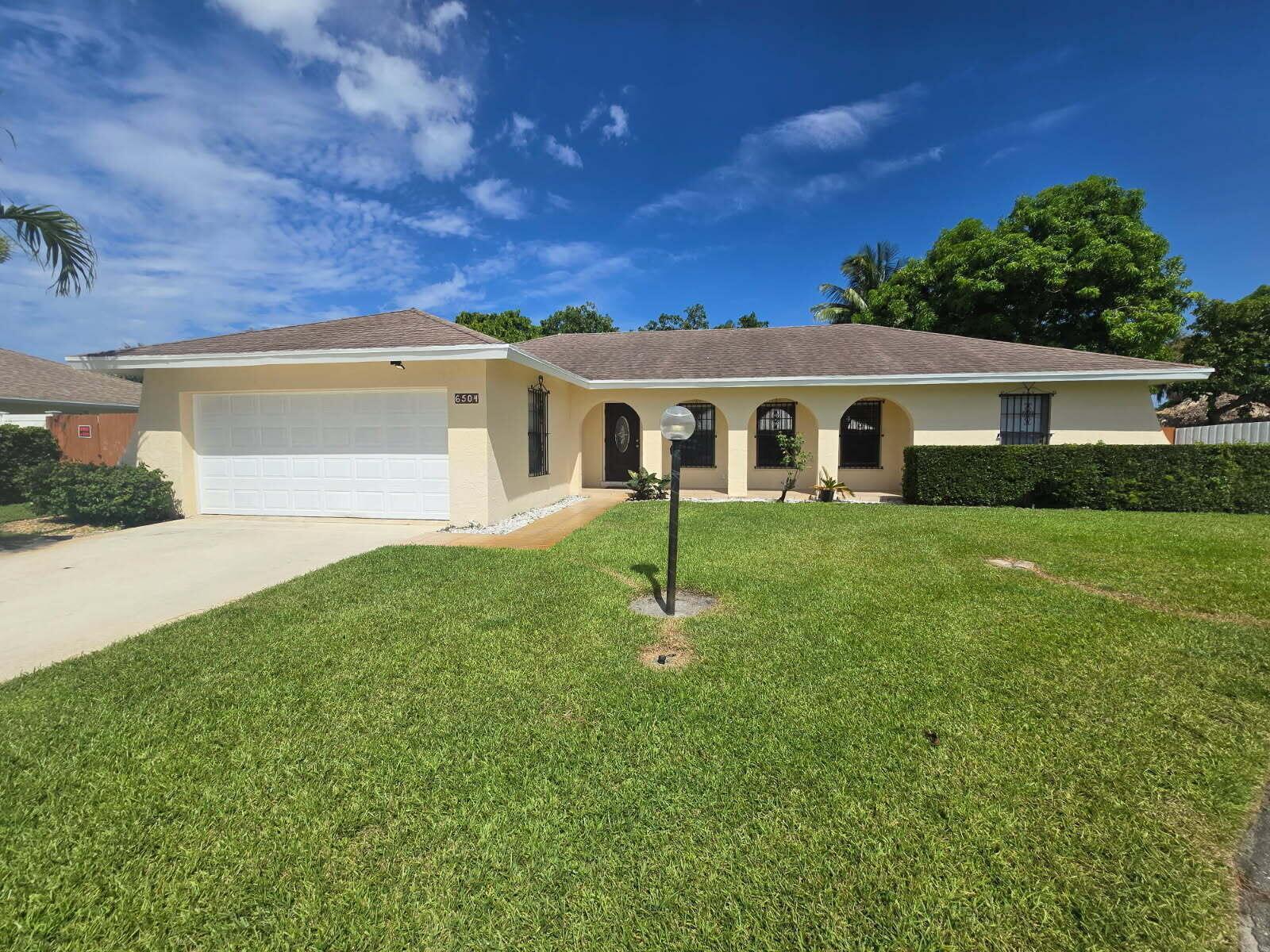 6504 Heather Way, Lake Clarke Shores FL 33406