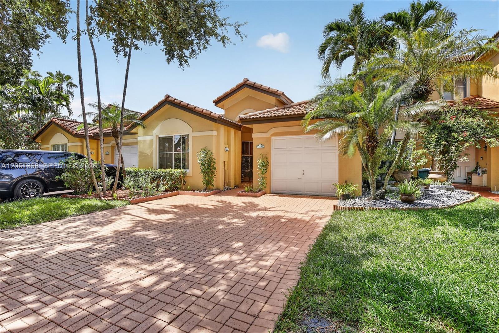 14147 N Forest Oak Cir, Davie FL 33325