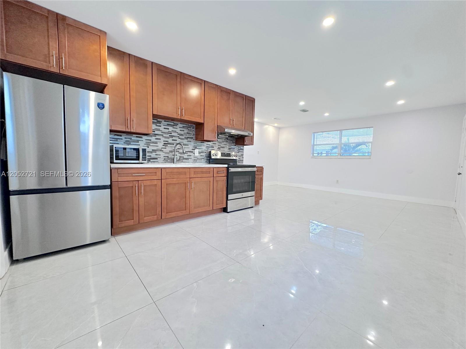940 NW 32nd Ct, Miami FL 33125