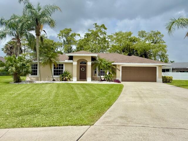 228 PARK Road N, Royal Palm Beach FL 33411