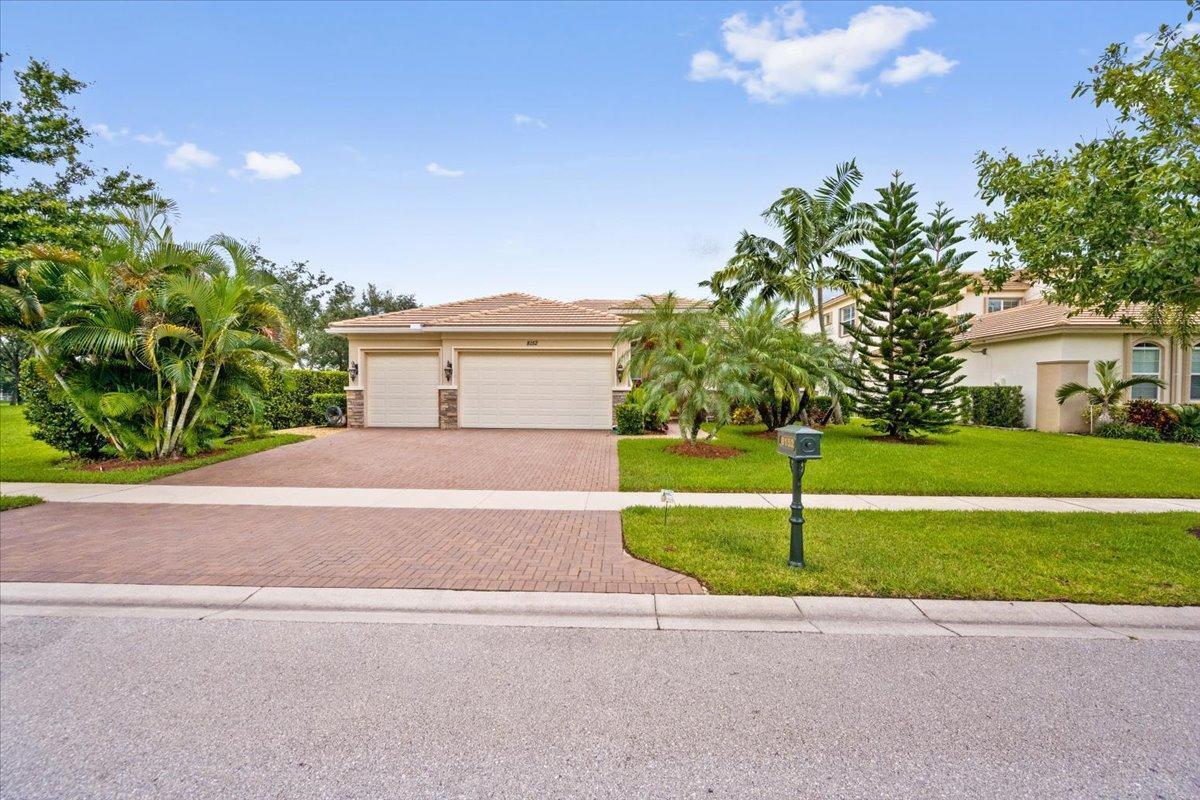 8152 Butler Greenwood Drive, Royal Palm Beach FL 33411