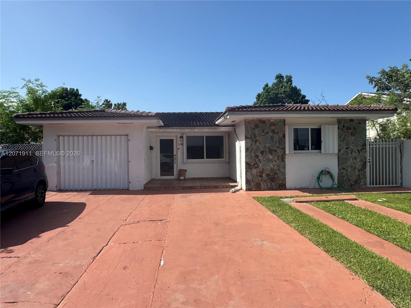 3160 NW 3rd St, Miami FL 33125