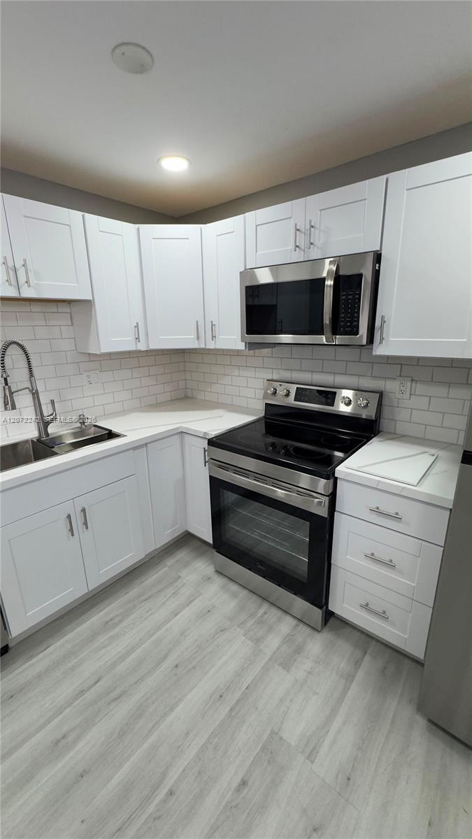 1280 NW 43rd Ave # 303, Lauderhill FL 33313
