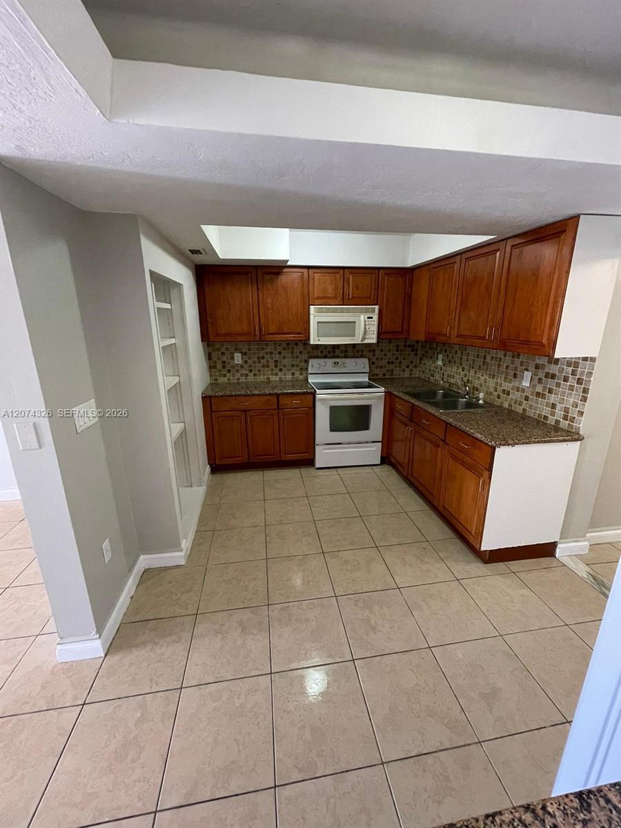 1567 NW 60th Ave # G, Sunrise FL 33313