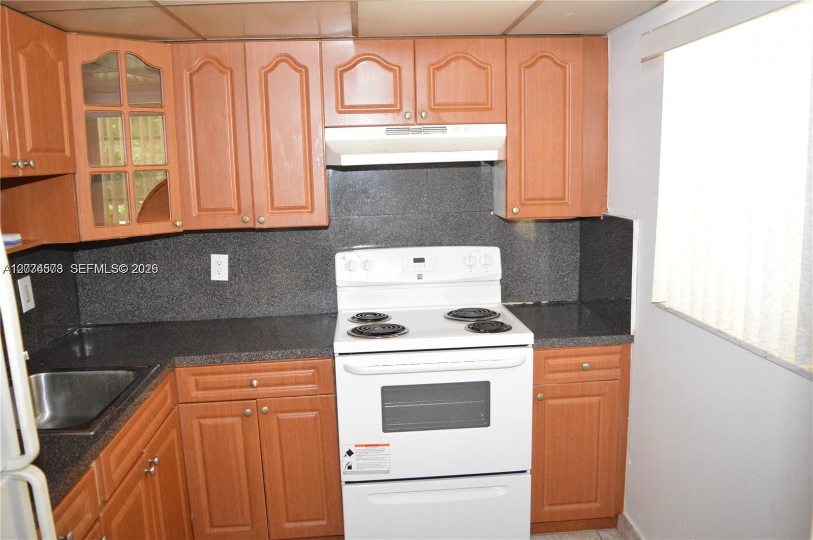 15600 NW 7th Ave # 216, Miami FL 33169