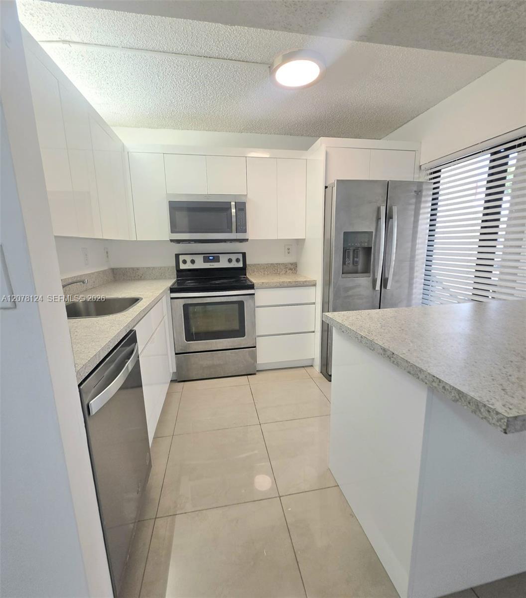 20105 NE 3rd Ct # 6, Miami FL 33179