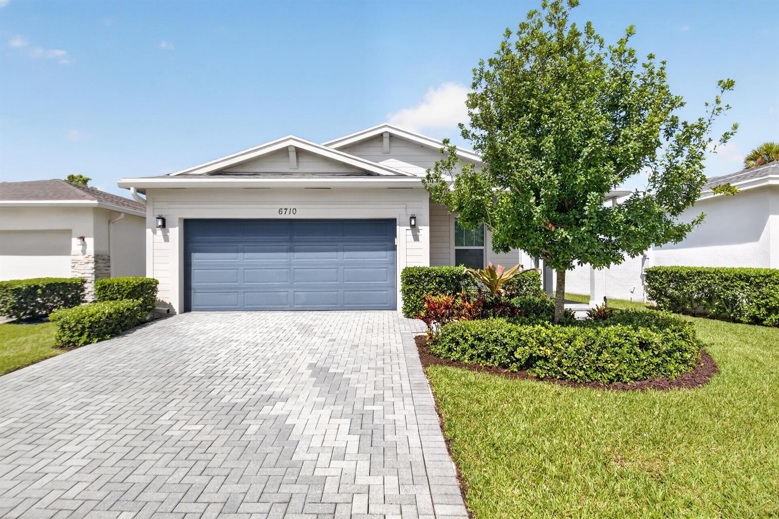 6710 POINTE OF WOODS Drive, West Palm Beach FL 33413