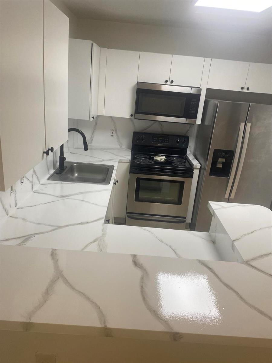 3740 N JOG Road # 106, West Palm Beach FL 33411