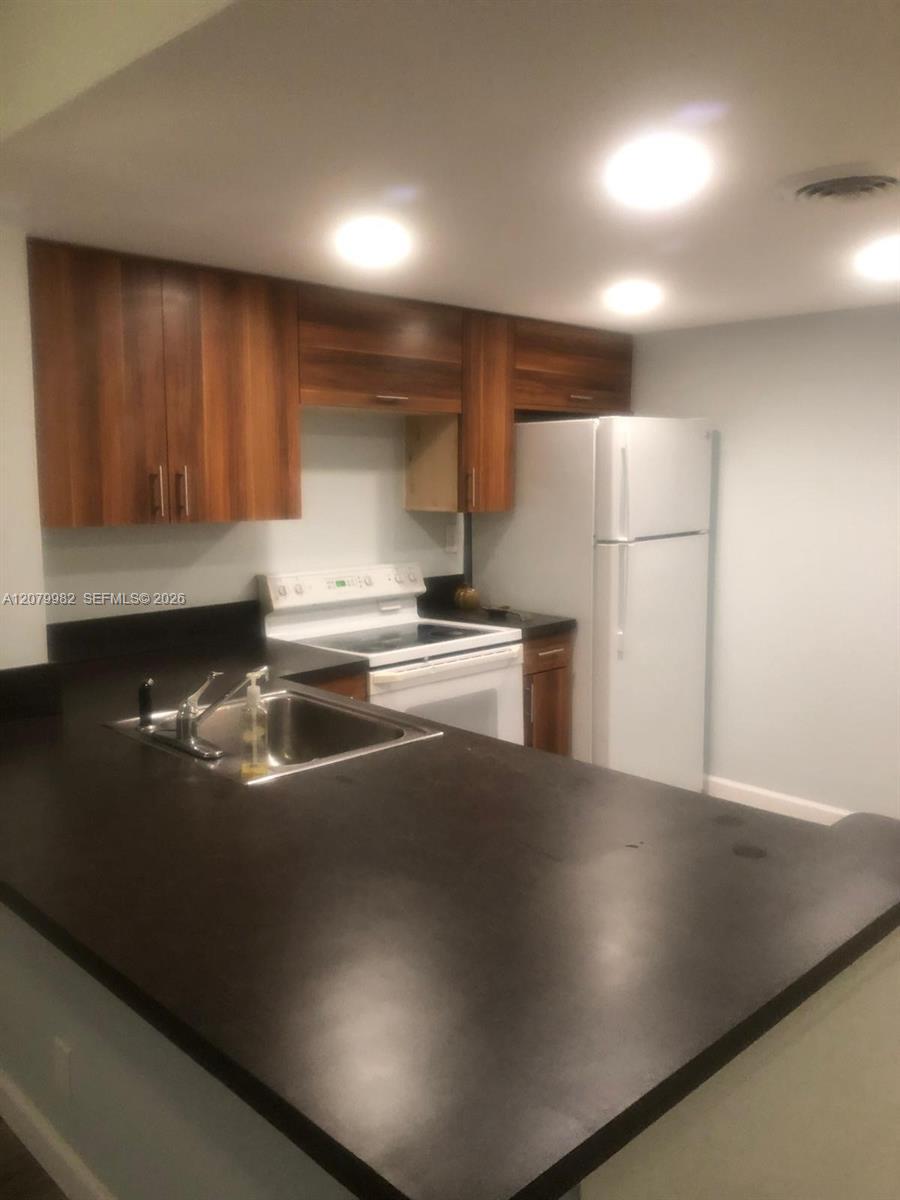 3700 N Pine Island Rd # 202, Sunrise FL 33351