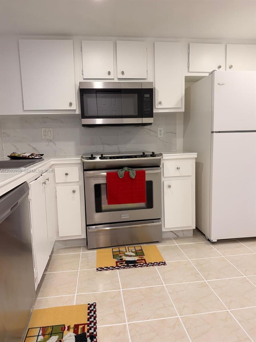 6575 W Oakland Park Blvd # 303, Lauderhill FL 33313