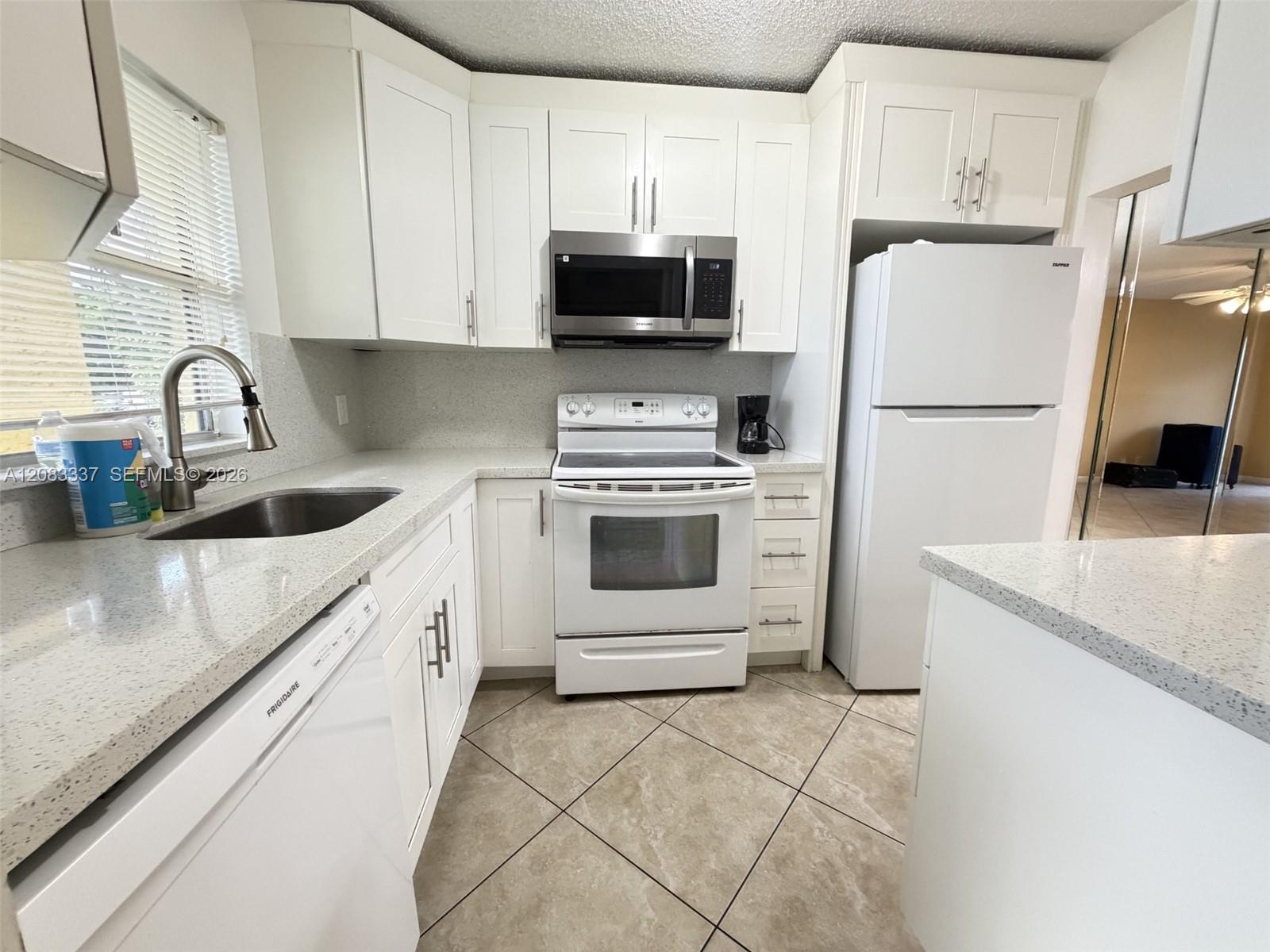 9949 Sandalfoot Blvd # 514, Boca Raton FL 33428