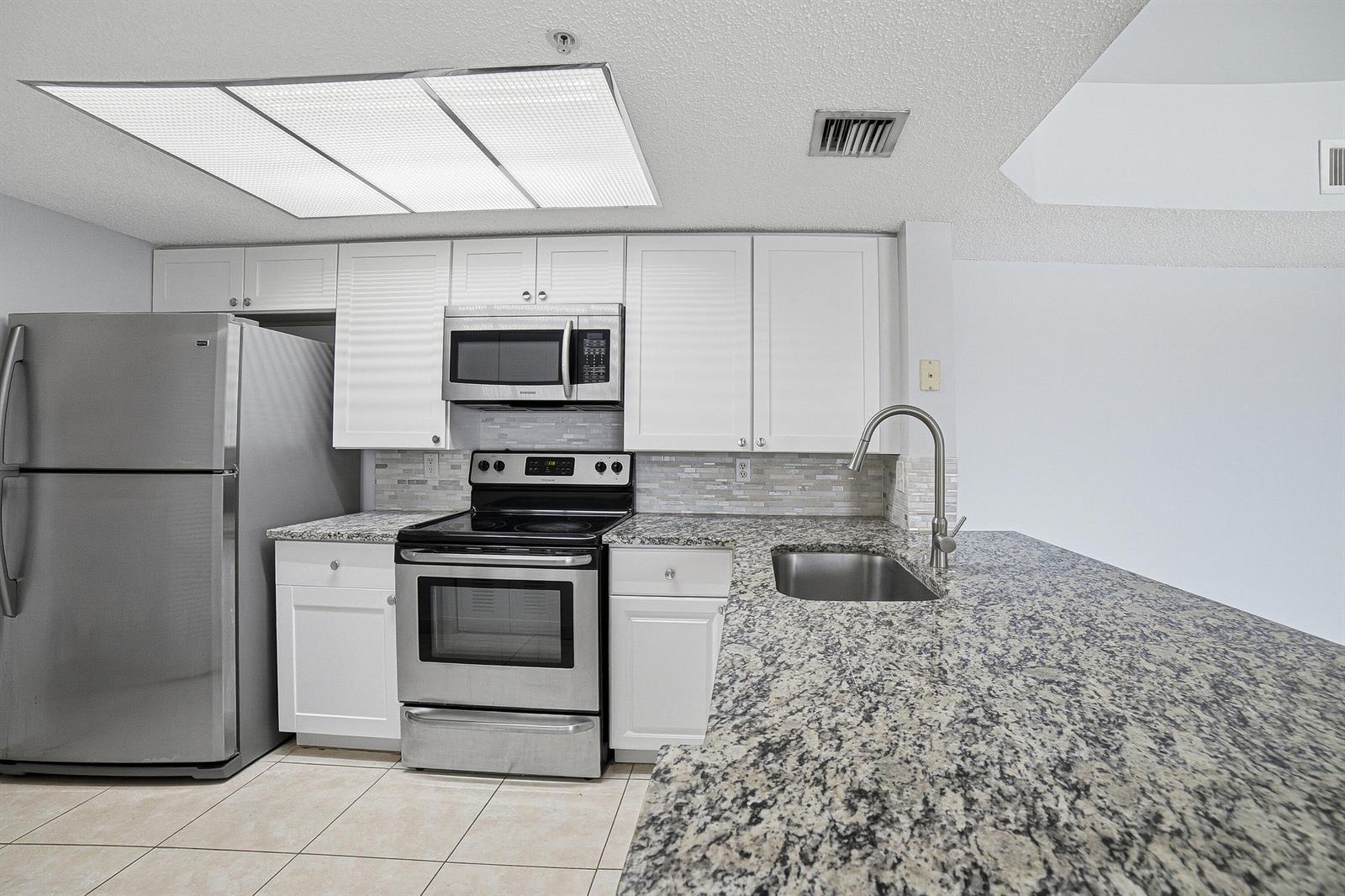 5045 WILES Road # 308, Coconut Creek FL 33073