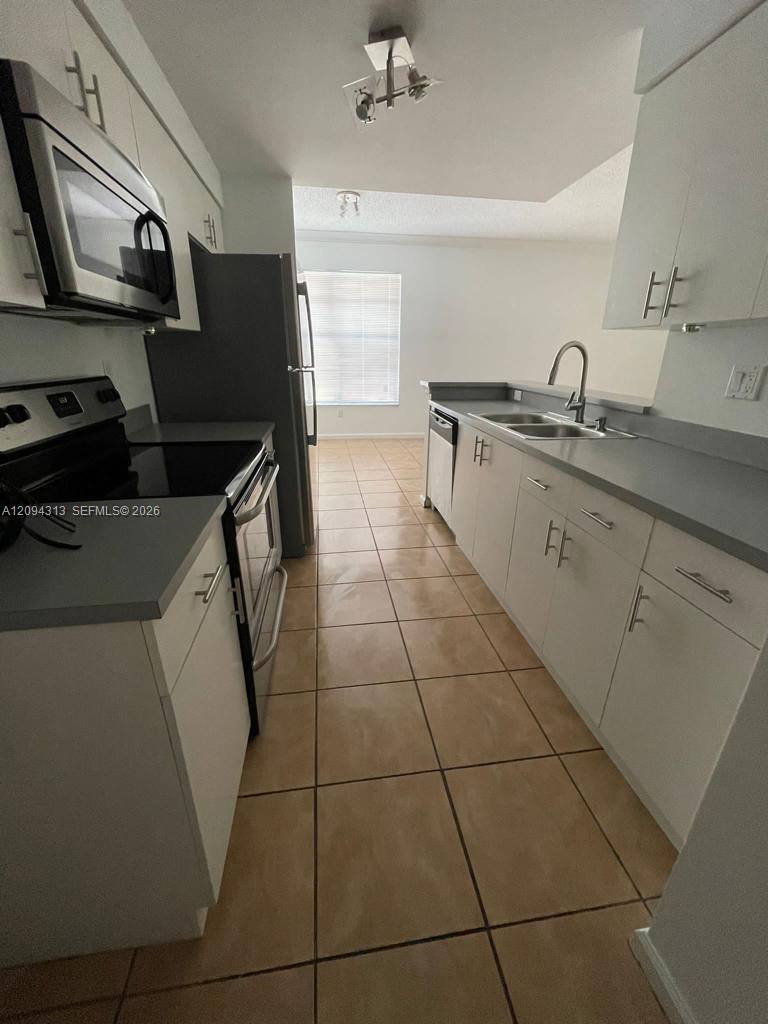 5840 W Sample Rd # 105, Coral Springs FL 33067
