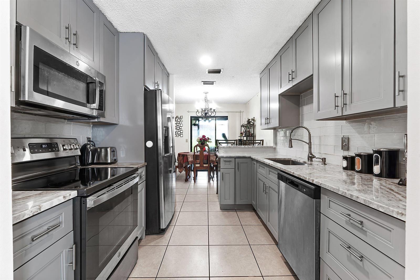 1595 Woodbridge Lakes Circle, West Palm Beach FL 33406