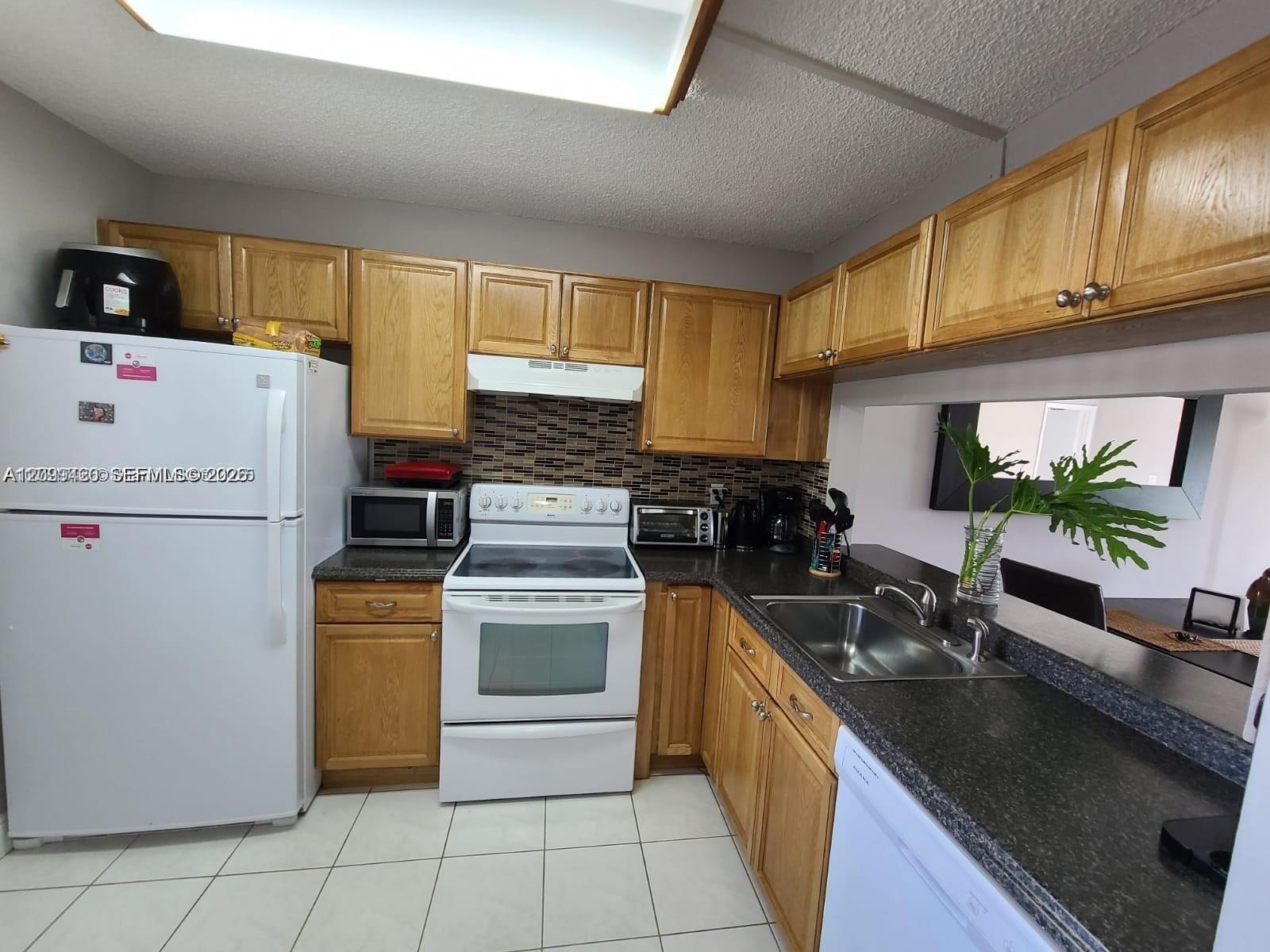 165 NW 93rd Ave # 102, Pembroke Pines FL 33024