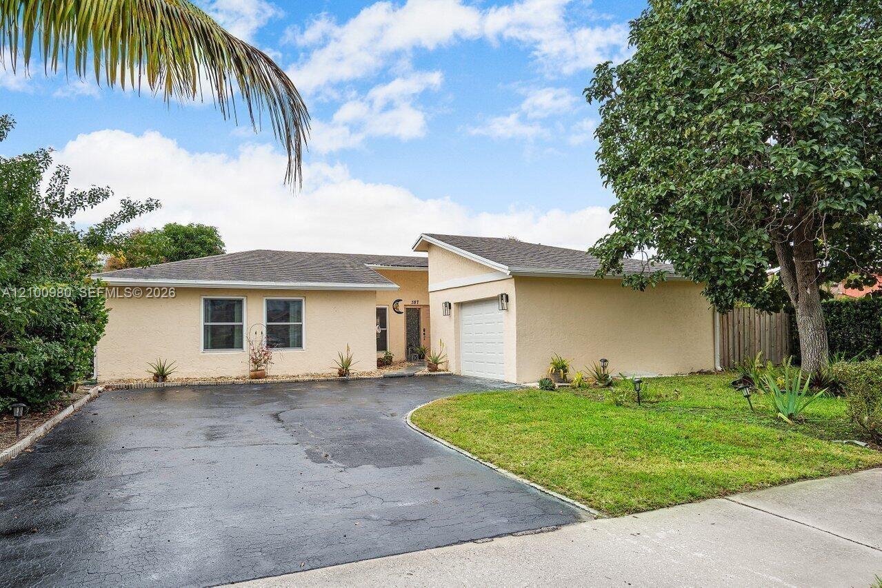 387 NW 39th Way, Deerfield Beach FL 33442