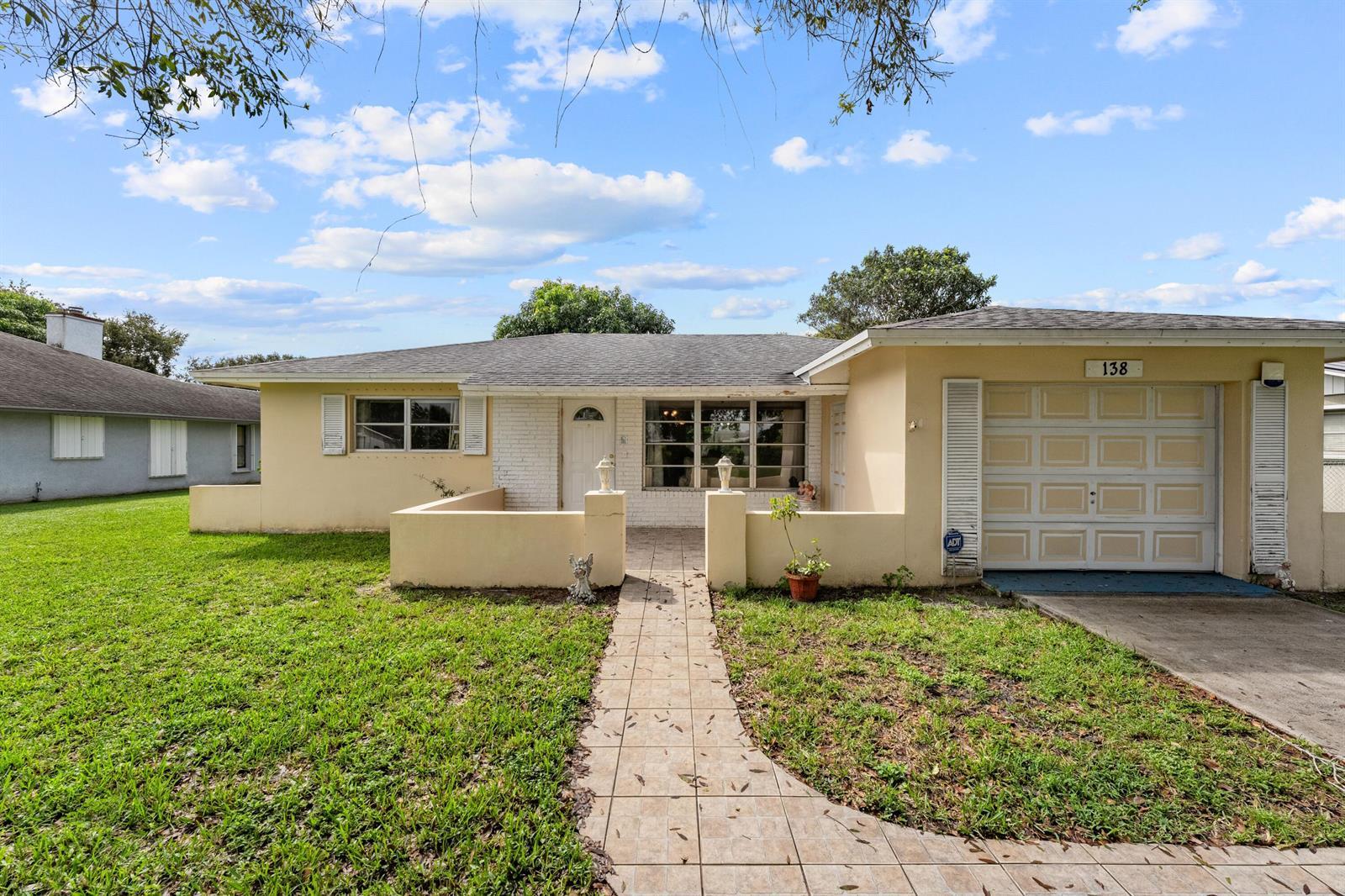138 Sandpiper Avenue, Royal Palm Beach FL 33411
