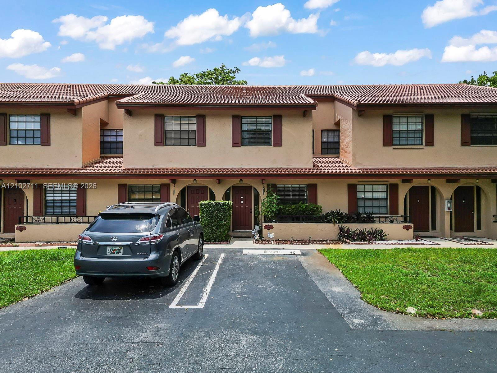 10942 W Sample Rd, Coral Springs FL 33065