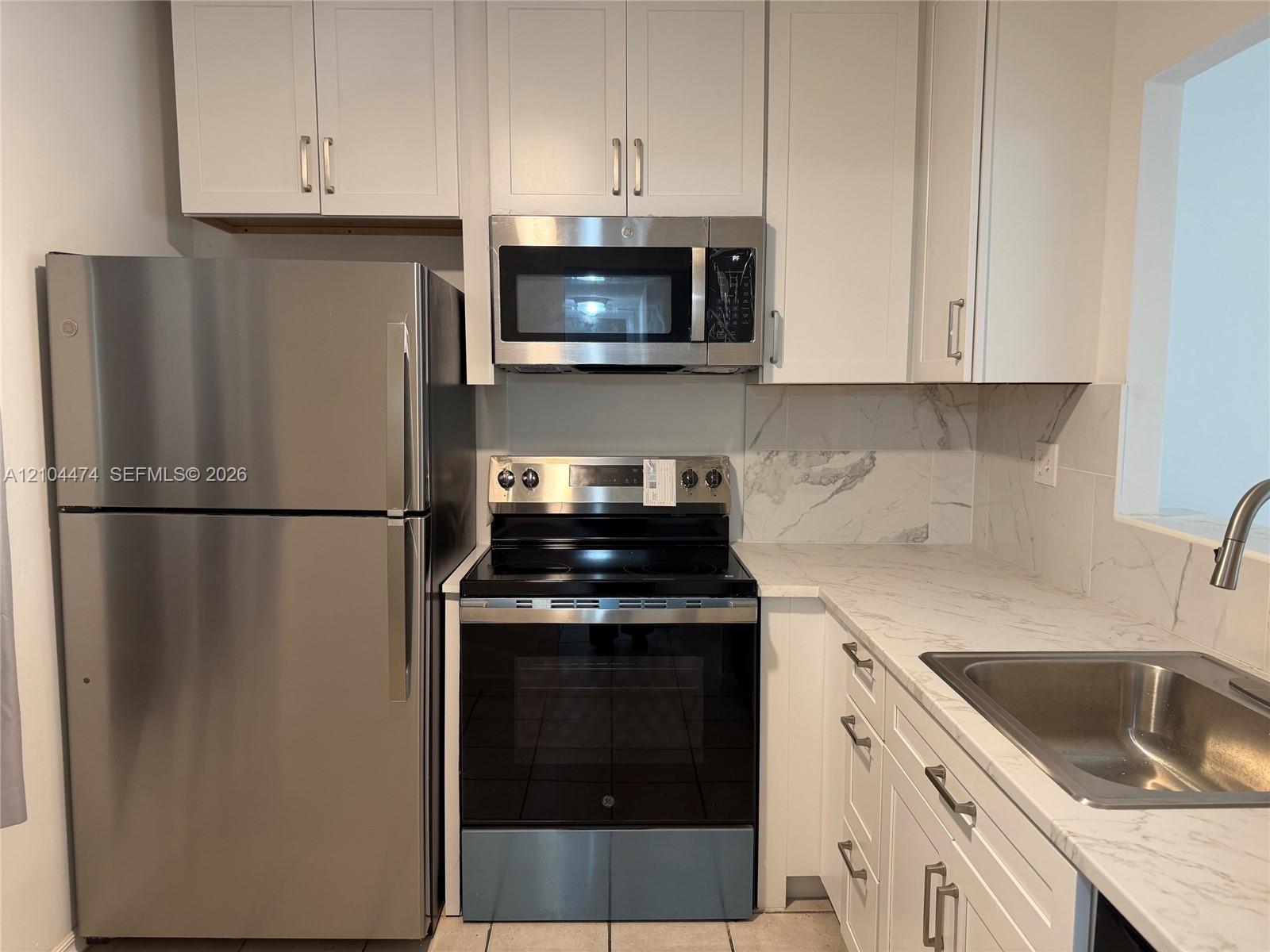 5001 W Oakland Park Blvd # 305, Lauderdale Lakes FL 33313