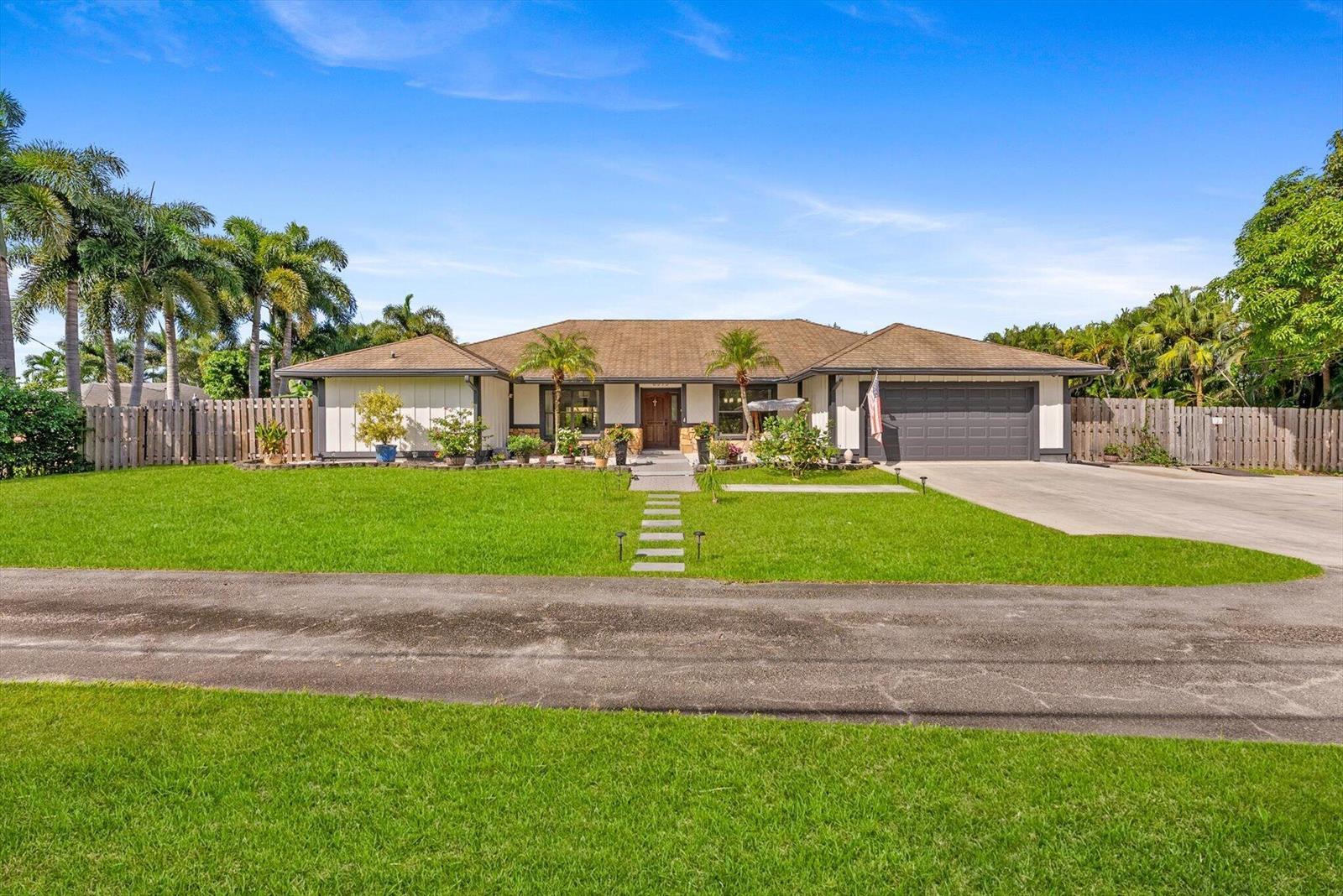 6515 Riparian Road, Atlantis FL 33462