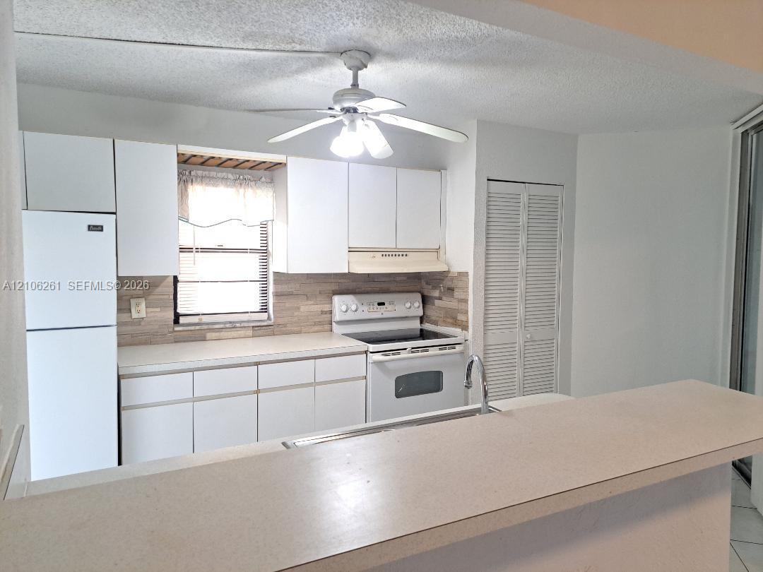 3100 N Pine Island Rd # 104, Sunrise FL 33351