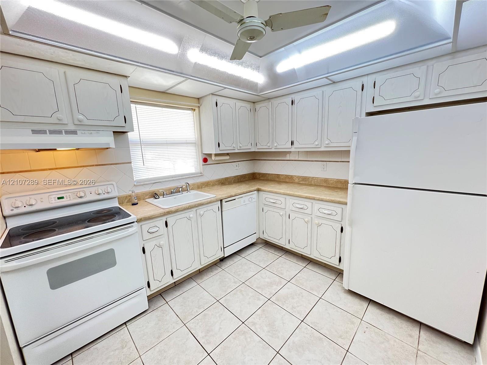 403 SW Natura Ave # F, Deerfield Beach FL 33441