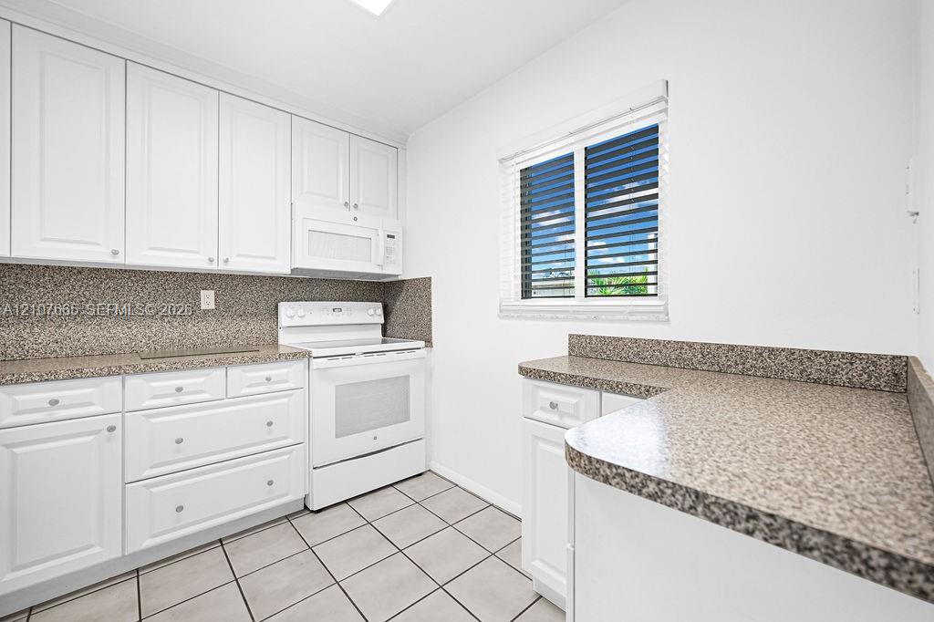7740 Camino Real # 407, Miami FL 33143